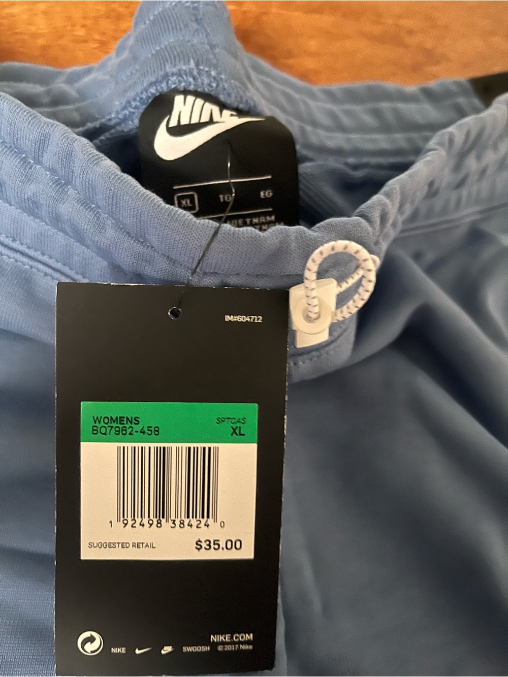 Nike Blue Women's Athletic Shorts with White Swoosh - Picture 2 of 3